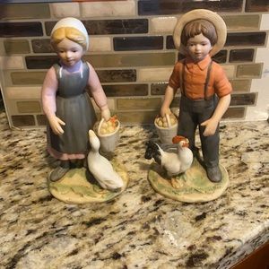 Vintage country boy and girl. Made by Homco or home interiors.